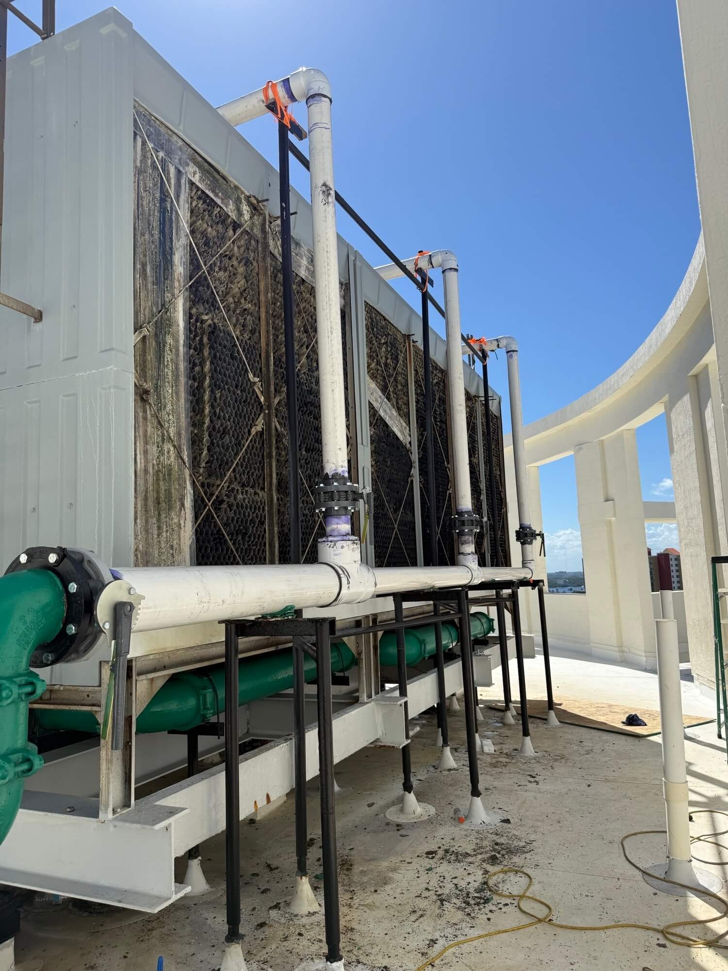 Refurbished and newly painted chilled water pump system after complete restoration
